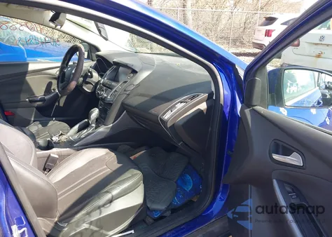 2013 Ford Focus Titanium z USA, uszkodzony, nr VIN 1FADP3N22DL128971